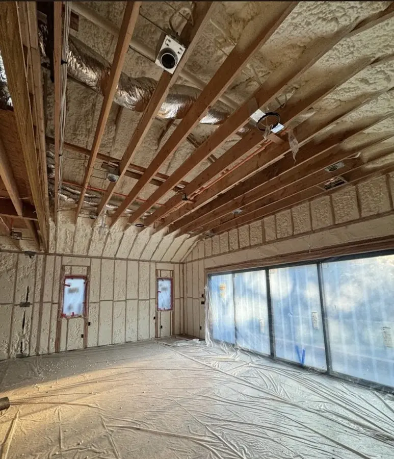 Interior walls and ceiling insulated with spray foam during new construction in Calumet Park